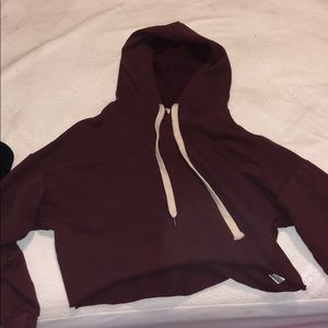 Maroon cropped hoodie.